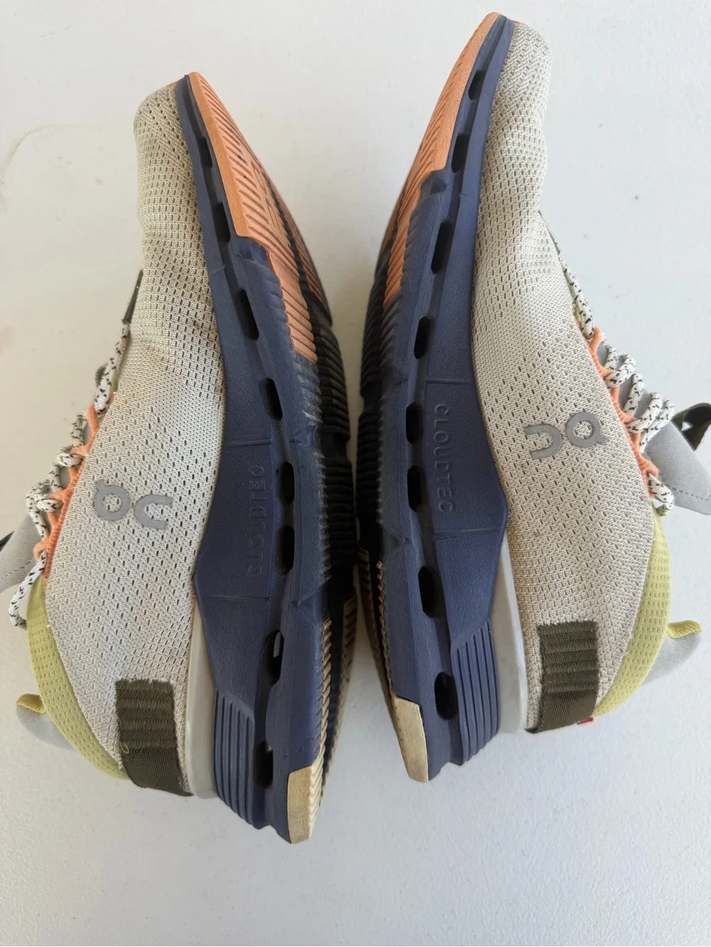 Light Neutral Athletic Sneakers with Navy Sole and Peach Accents